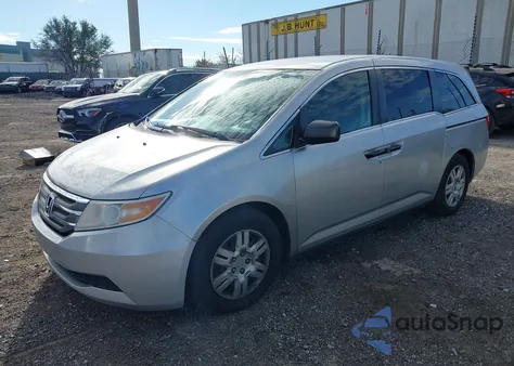 2012 Honda Odyssey Lx z USA, uszkodzony, nr VIN 5FNRL5H26CB011897